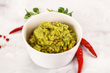 Guacamole with avocado, tomato and chili