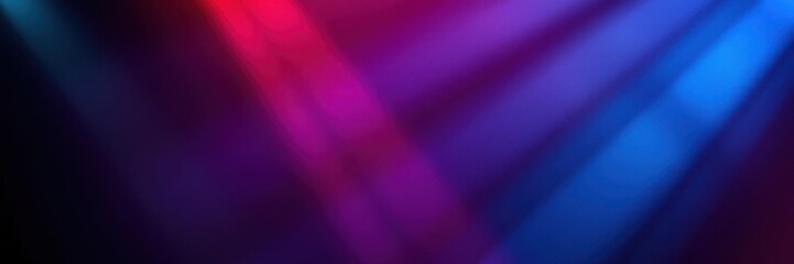 Fototapeta premium Colorful abstract background with vibrant light beams glowing in various shades creating an artistic and dynamic atmosphere for creative projects and media.