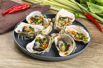 Baked oysters with green onion
