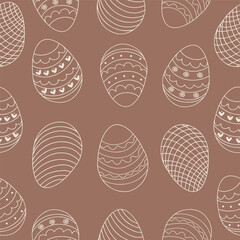 Seamless pattern of Easter eggs in doodle style. White icons of eggs with ornaments for Easter holiday decoration. Vector illustration on mocha mousse background.