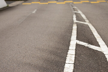 Asphalt highway with white road markings lines background