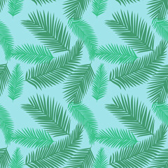 Palm leaves seamless pattern, background vector in natural green color on blue background. Design for fabric, print, cover, banner, decoration, wallpaper.