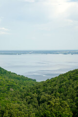 View of the Volga River in Tatarstan, Russia. Endless blue river in summer. Calm natural landscape.