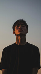 Obraz premium silhouette of a person, silhouette of a man, portrait of a man, asian model