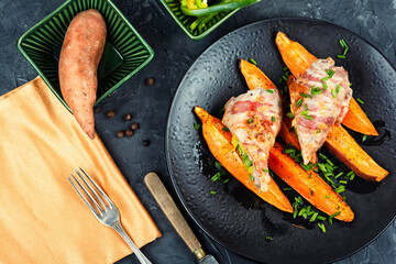 Baked meat roll with sweet potato.