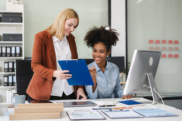 Diverse professionals collaborate on project analysis with financial graphs. Strategic teamwork and insights drive company growth and success.