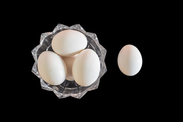 Kampung chicken eggs or telur ayam kampung Three Goose eggs on black background salted egg made...