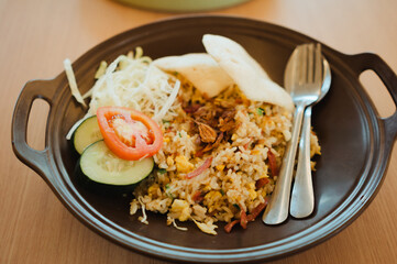 A plate of Indonesian nasi goreng or fried rice