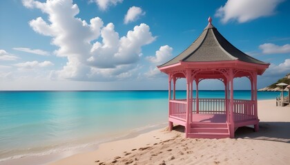 Fototapeta premium A gazebo on a sandy beach with turquoise blue water and a cloudy sky in the background