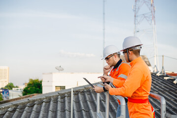 An electrical engineers are seriously planning to prepare a place to install solar panels in the office.