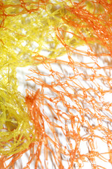 Orange and Yellow Mesh Abstract Wire Netting Background