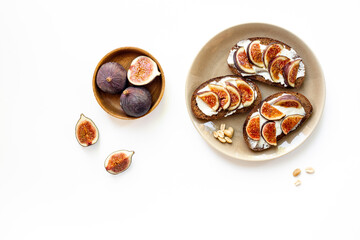 Fig sandwiches with cheese and honey for breakfast. Top view