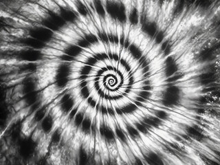 Fototapeta premium Monochrome tie-dye spiral with vibrant colors creating a boho psychedelic effect