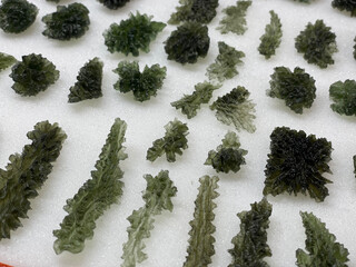 Deeply scupted moldavite from Besednice