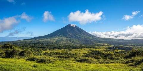 Fototapeta premium Pico Volcano stands as a stunning natural landmark, showcasing the beauty and magnificence of volcanic landscapes. Experience the awe of Pico Volcano, a true representation of volcanic splendor.