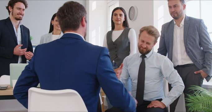 Business happy people hand shake after negotiating best deal in office, entrepreneur buying, selling agreement for effective competitive and collaborative project achieving mutually beneficial result