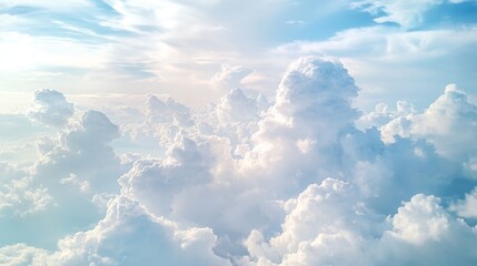 Fototapeta premium Gorgeous white clouds gracefully fill the sky, creating a stunning backdrop. The beautiful white clouds enhance the serene atmosphere of the vast sky, inviting calm and inspiration.
