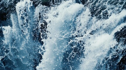 Keila waterfall texture, Estonia. Close-up, long exposure. Blue and white water splashes. Abstract natural pattern. Environmental conservation, travel destinations, graphic resource. Panoramic image