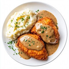 Top View of Southern Fried Chicken Breast with Mashed Potatoes and Gravy on White Dish