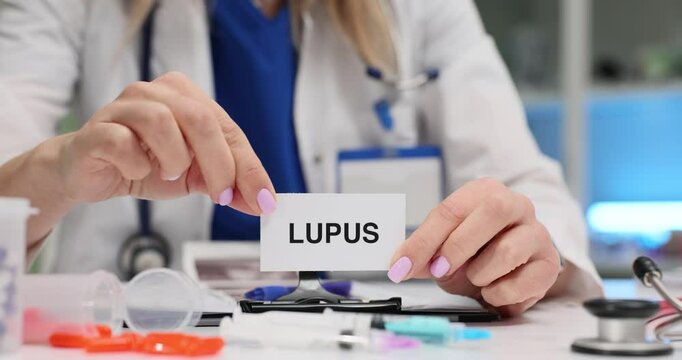 A healthcare professional is highlighting the complexities of lupus within a clinical setting, emphasizing education