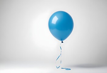A blue balloon floating against a white background