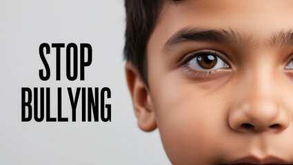 close up of child face with text STOP BULLYING emphasizes importance of anti bullying awareness and advocacy. image conveys serious and emotional message