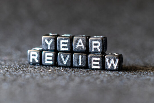 End of the year business concept. Flipping of 2024 to 2025 on black blocks. 2024 business and customer review for business strategic planning in the next year 2025. End of the year business concept.	