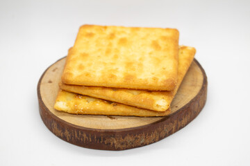 Biscuits on wood slice with white background
