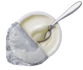 Mascarpone cream cheese in an open package with a spoon on a white background. Top view