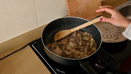 Cooking a Delicious Vegetarian Dish in a Modern Kitchen