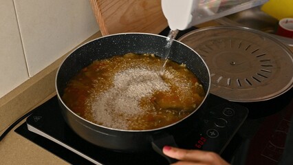 Preparing a flavorful homemade meal with fresh ingredients and love