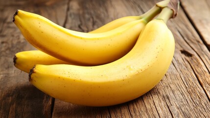 Fresh Yellow Bananas on a Rustic Wooden Table Ready for Cooking or Snacking