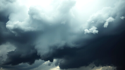 Obraz premium Intense thunderstorm clouds gather, creating a dramatic, foreboding atmosphere with shades of gray and white. Capturing the powerful weather, this image evokes a sense of awe and nature's raw beauty.