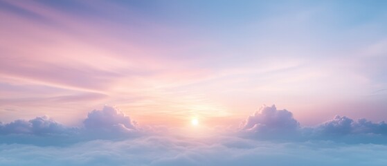 The sky is a beautiful shade of pink and blue with fluffy clouds