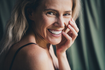 Fototapeta premium No filter cropped studio photo of sweet pretty woman wear lingerie loving herself arm cheek isolated khaki textile background