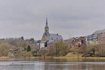 a photo of the church prominent in the city skyline