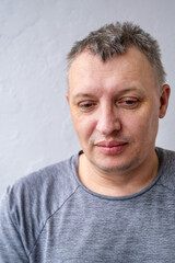 Obraz premium distorted face of sad and grieved very upset person, dissatisfied with his hard fate