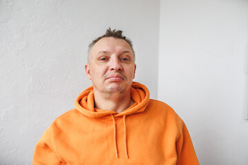 distorted face of sad and grieved very upset person, dissatisfied with his hard fate