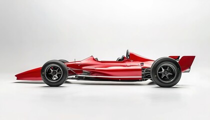 A red Formula race car with black wheels, on a white background, in a side view.