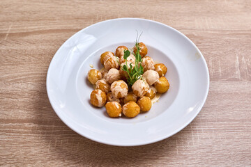 Crispy Fried Potato Balls with Creamy Sauce