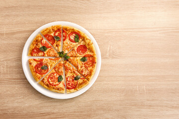 Sliced Margherita Pizza with Tomatoes and Basil