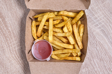French Fries with Ketchup in a Takeaway Box