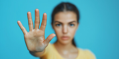 Empowering gesture woman stopping negative energy studio portrait bright colors close-up self-confidence concept