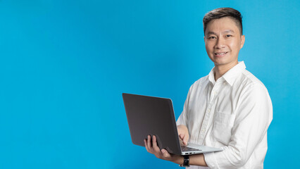 Confident young businessman in white shirt standing typing on laptop in various emotions