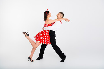 Photo of charming lovely couple ballroom dancers studying dance studio isolated on white color...
