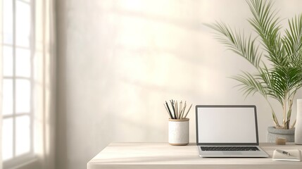 Fototapeta premium scandinavian-inspired workspace with neutral-toned desk laptop and potted plant