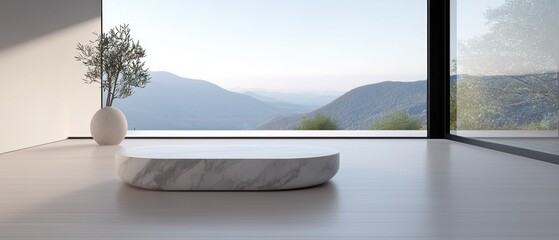 A white marble table sits in front of a window overlooking a mountain range