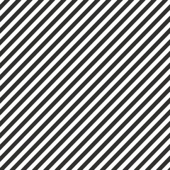 Obraz premium A pattern of diagonal black and white stripes creating a visually striking graphic design.
