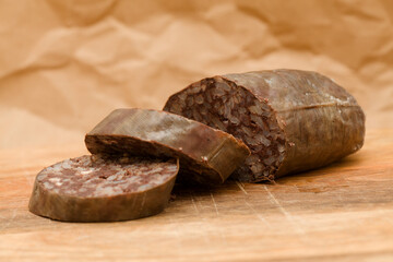 Morcilla, blood sausage with rice, typical of Spain, macro food background