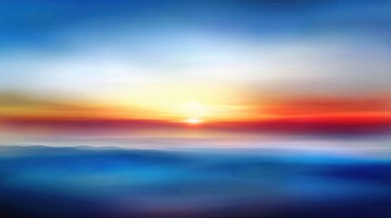 Obraz premium Vibrant sunset over a hazy landscape.